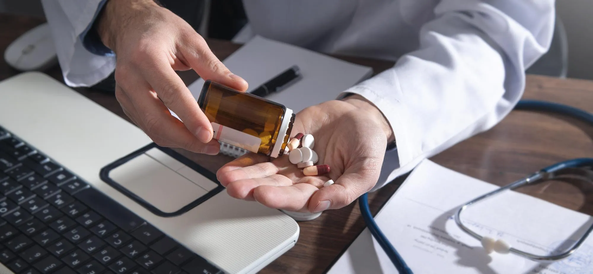 Pharmacist dispensing medications as part of professional Medication Management Services.