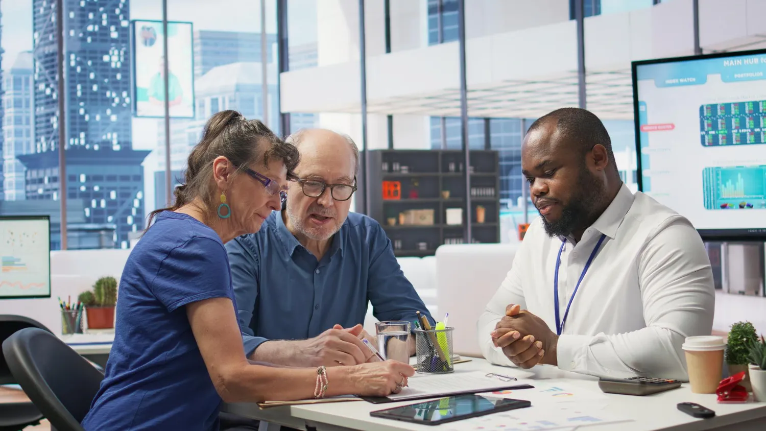 Healthcare professionals discussing clinical trials information with a research participant.