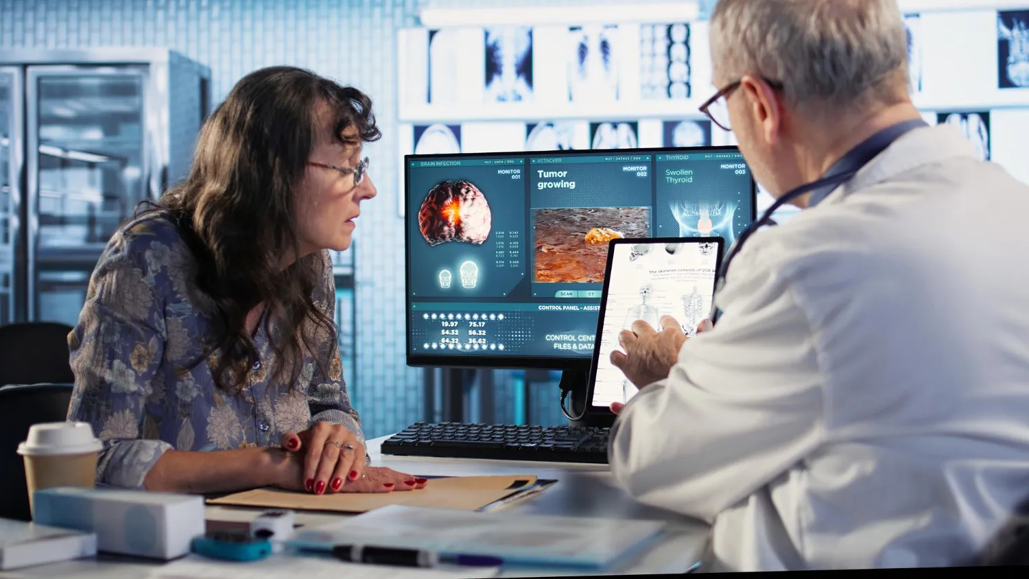 Healthcare service provider reviewing digital medical imaging and patient records with a patient, demonstrating technology-driven patient support, care coordination, and real-time patient tracking for informed treatment decisions.