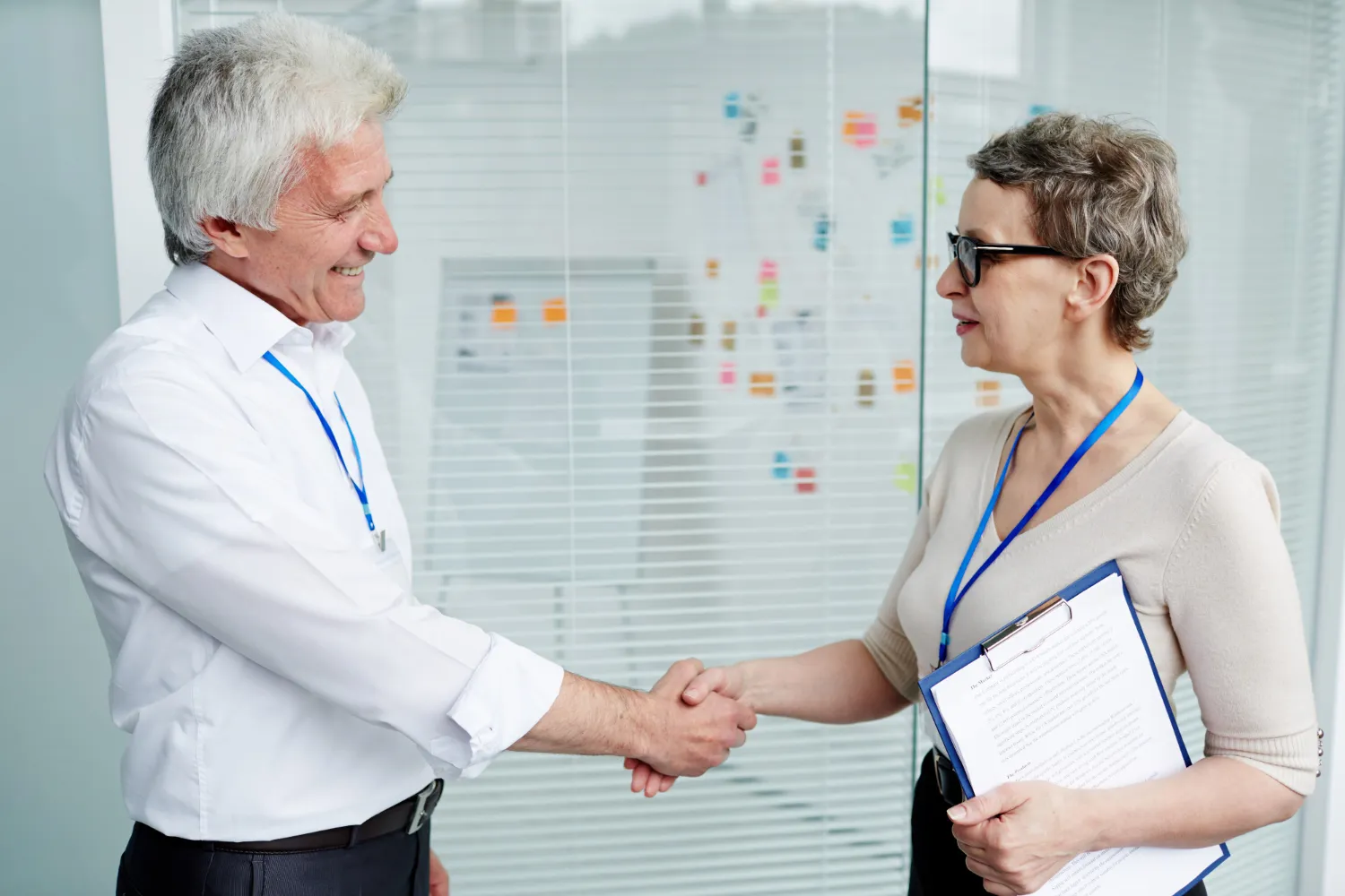 Healthcare professional discussing a patient referral as part of a healthcare referral management system.