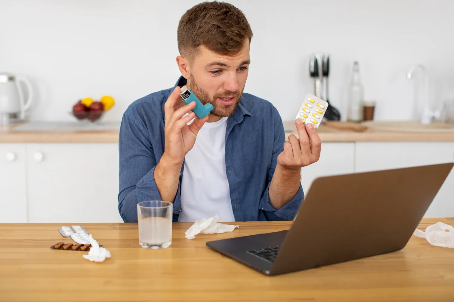Patient consulting online about prescription medication and remote medication management with inhaler and pills