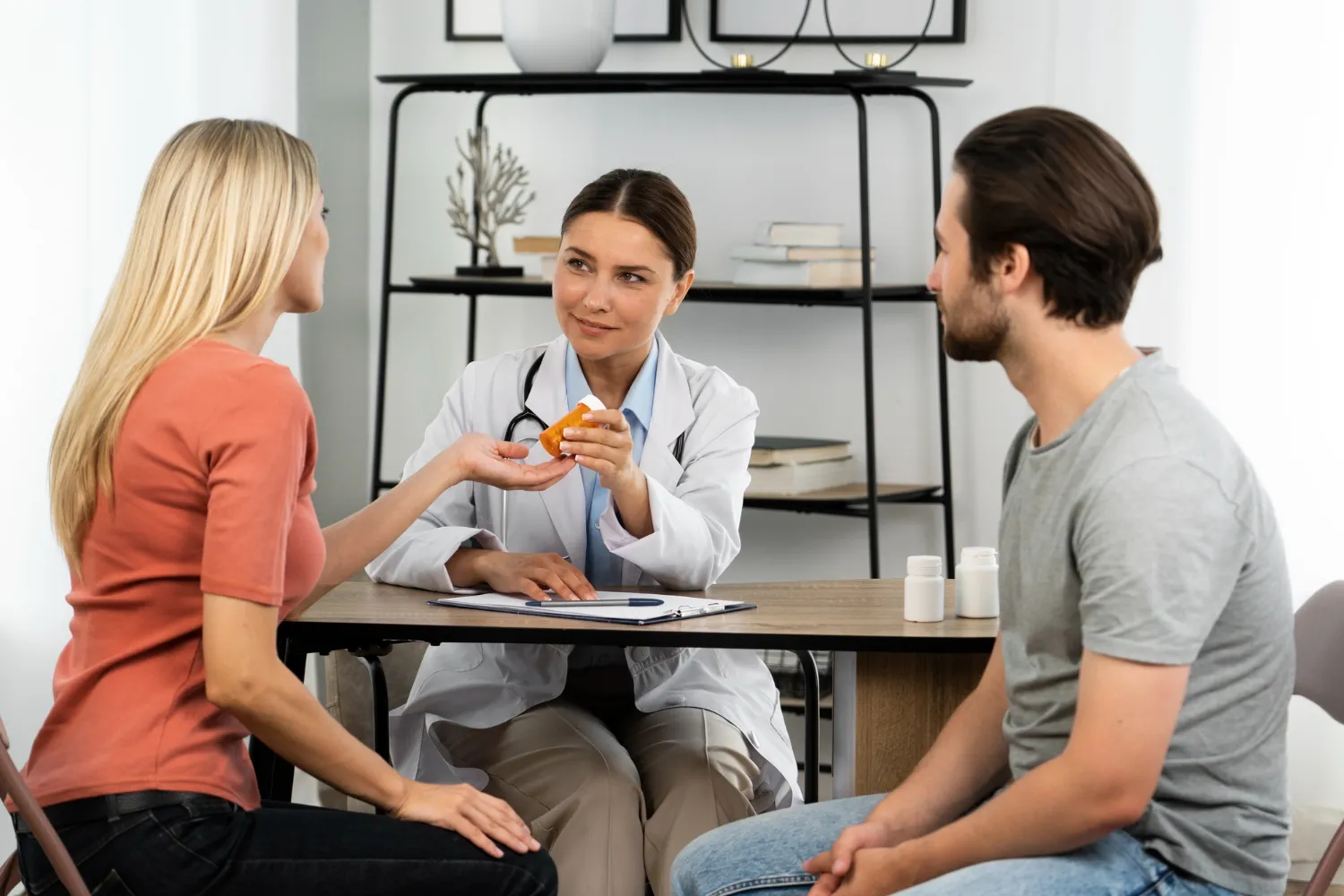 Doctor providing medication guidance as part of principal care management and patient care services for chronic disease support