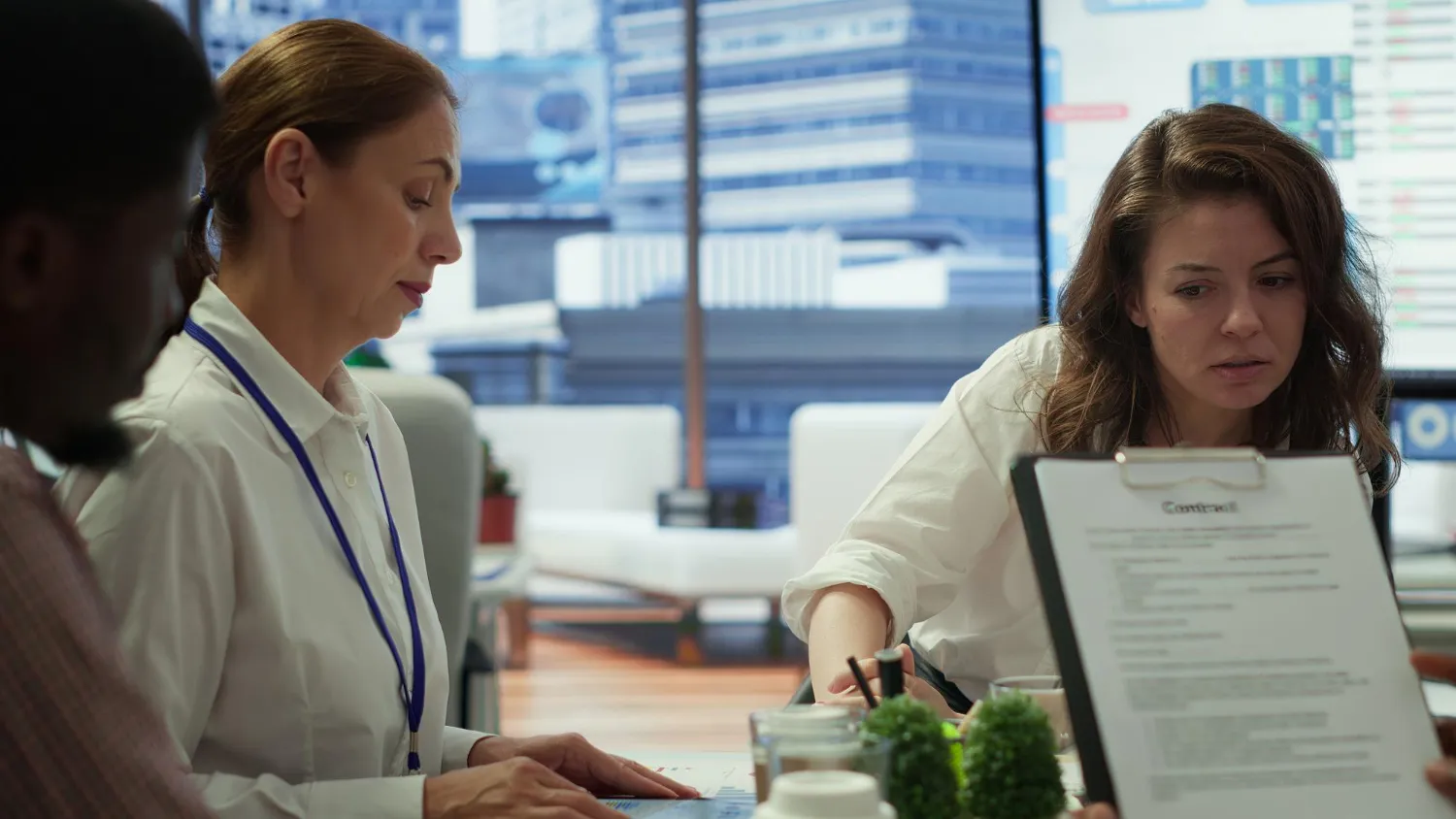 Doctor monitoring patient recovery and reviewing medical reports under Medicare transitional care management for improved outcomes