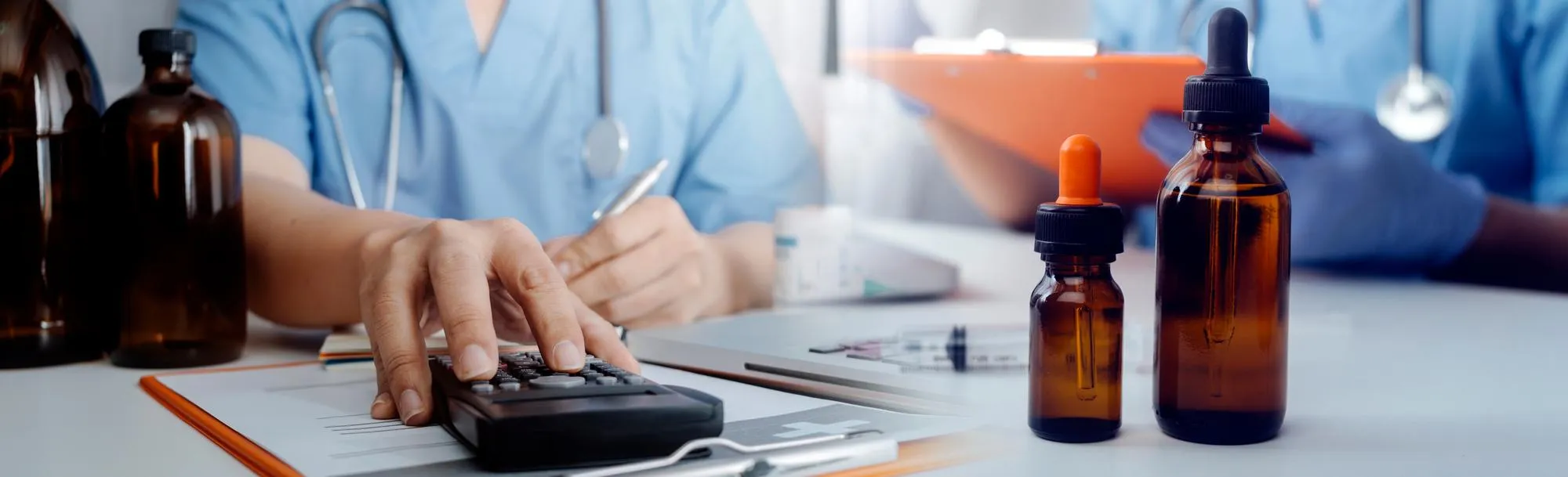 Healthcare professional reviewing patient data alongside medications, representing advanced Remote Patient Monitoring systems supporting ongoing care and treatment management