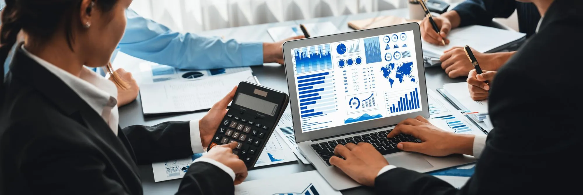 Business team analyzing healthcare data and financial metrics for MIPS reporting services and medical practice performance improvement