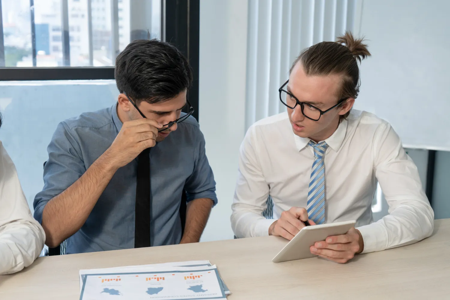 MIPS consultant reviewing healthcare performance metrics and quality reporting data with a provider to improve MIPS compliance and reimbursement outcomes