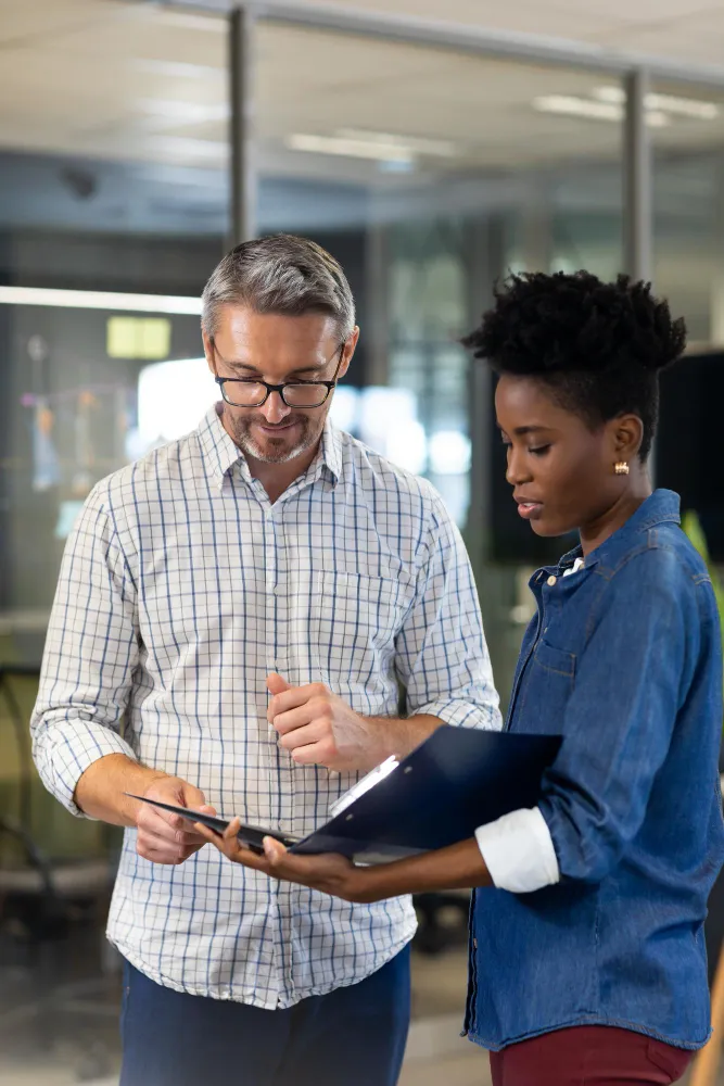 Healthcare professionals reviewing patient care information for chronic care management for providers.